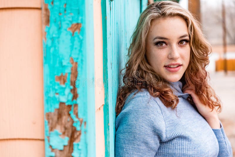 Pretty blonde girl woman in turtleneck sweater