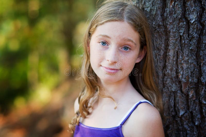 Pretty blue eyed girl stock photo