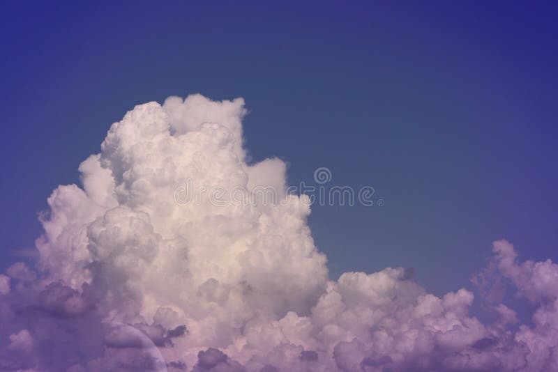 Amazing colorful cumulus clouds on the sky for using in design as background. royalty free stock photography