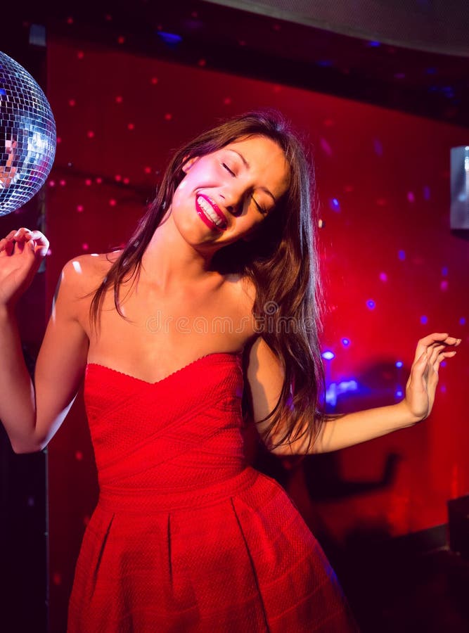 Pretty Brunette Dancing and Smiling Stock Photo - Image of frivolity ...