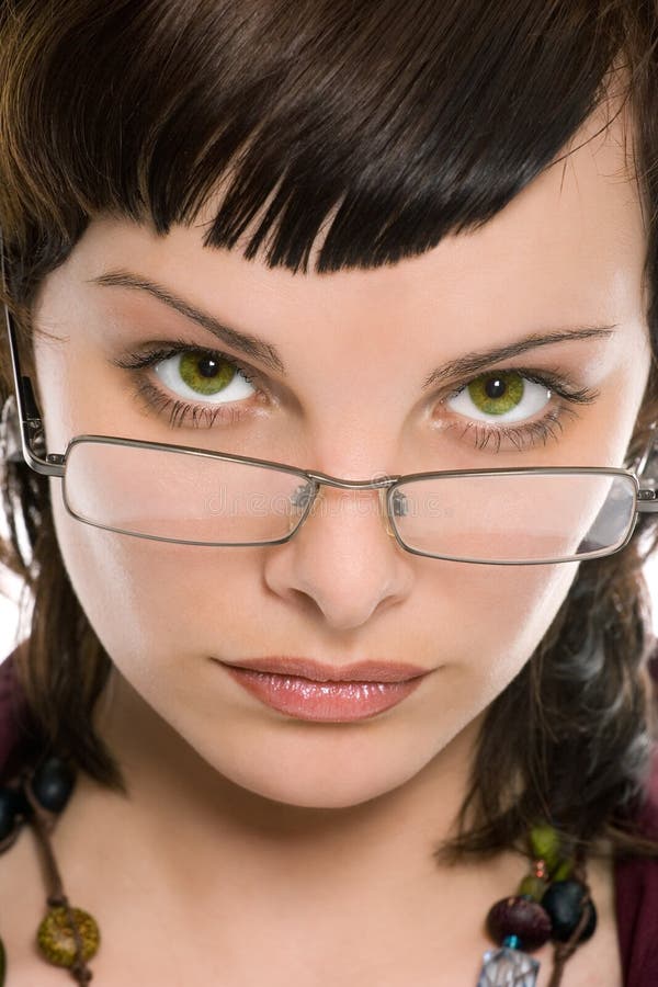 Pretty brunette girl in glasses portrait