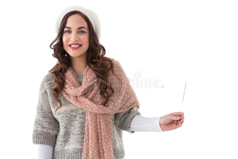 Pretty brunette in winter clothes holding on white background. Winter woolen clothes stock images, royalty-free photos and pictures