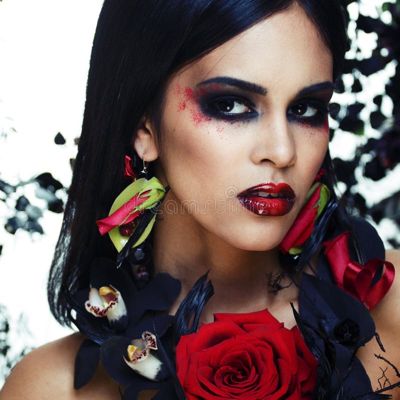 Pretty Brunette Woman with Rose Jewelry, Black and Red, Bright Make Up ...