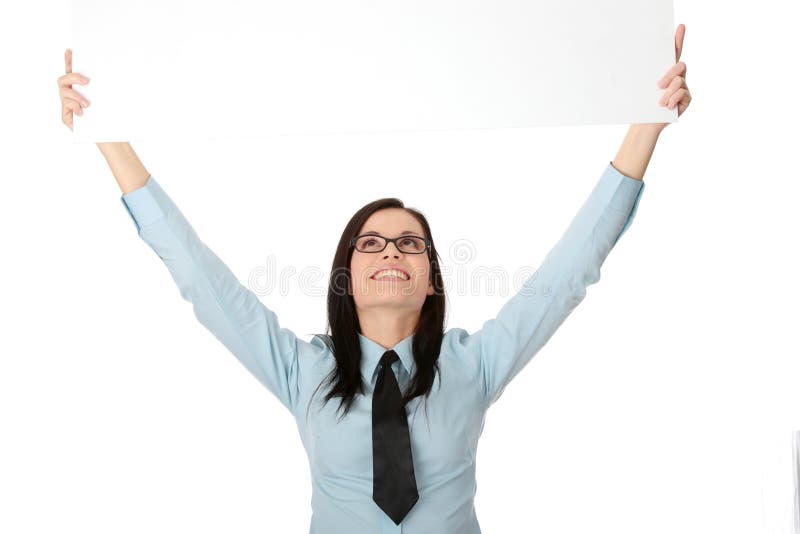 A pretty business woman holding a blank sign royalty free stock photography