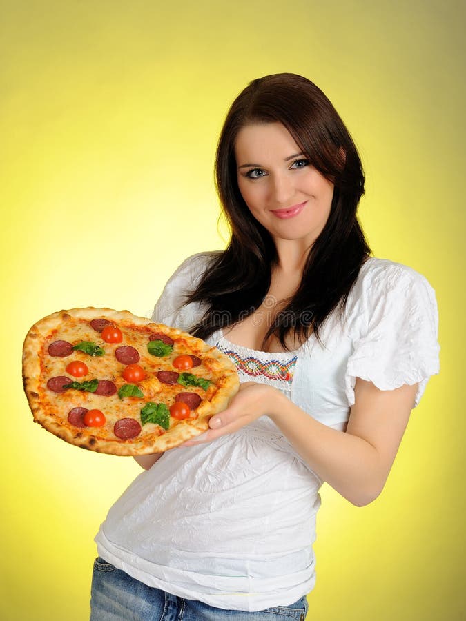 Pretty casual girl with pizza in delivery box