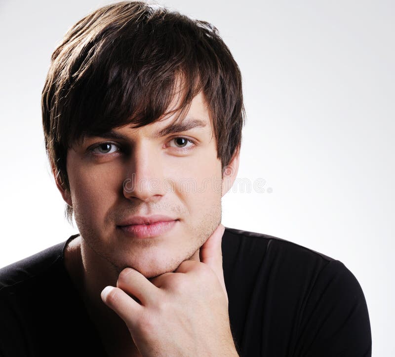 Pretty caucasian young guy stock images