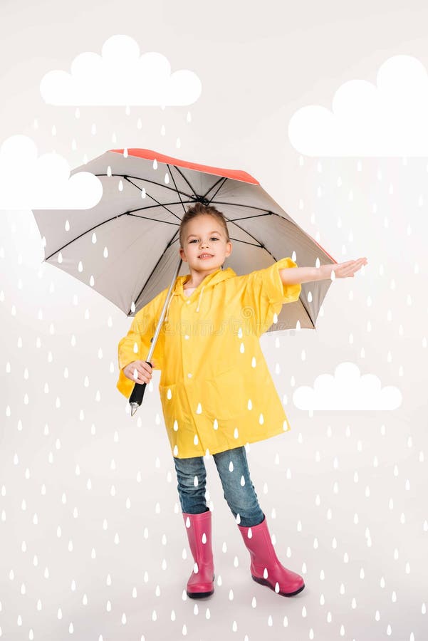 pretty child in rubber boots, yellow raincoat with umbrella, stock image pretty child in rubber boots, yellow raincoat with umbrella, stock image