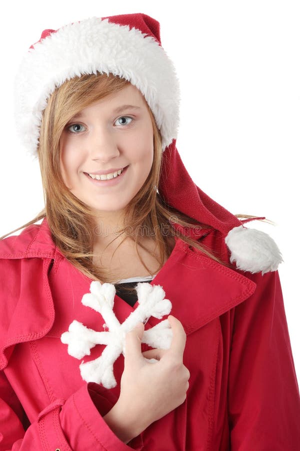 Pretty christmas teen girl in santa hat