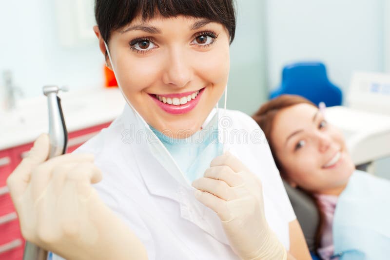 Dentist at work stock image. Image of clinical, oral 17034531