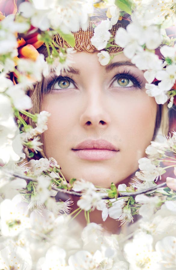 Pretty Female Face among the Petals Stock Image - Image of flower, cute