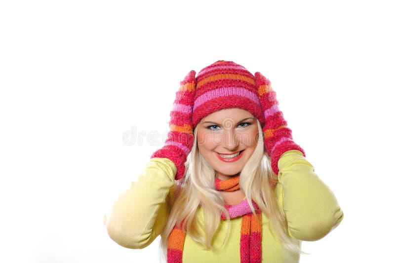 Pretty funny winter woman in hat and gloves