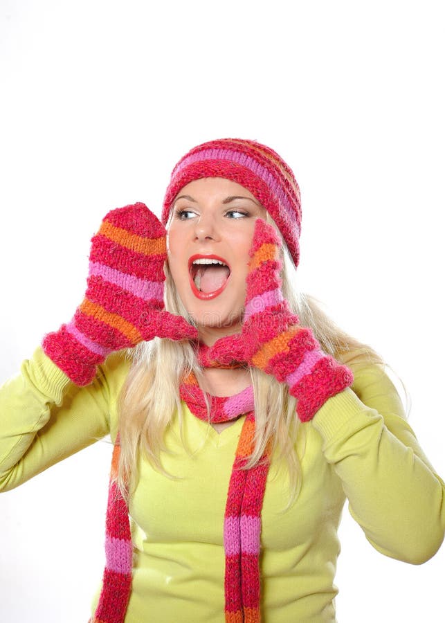 Pretty funny winter woman in hat and gloves