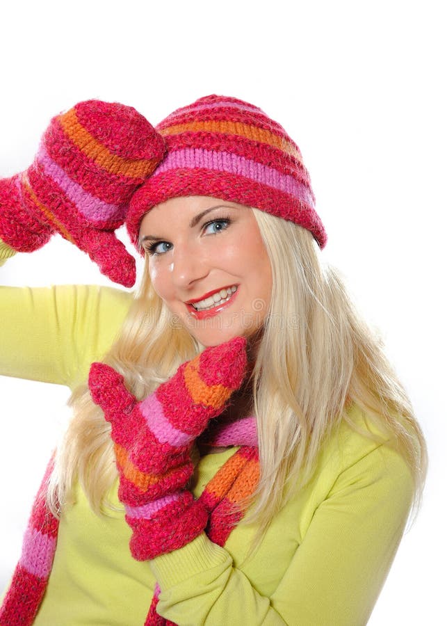 Pretty funny winter woman in hat and gloves