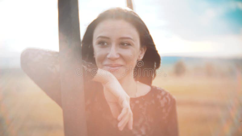 Pretty girl brunette portrait large lips wind develops hair portrait slow motion video. brunette woman girl hair