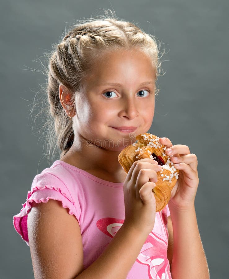 Pretty girl eating cookie stock image. Image of person 32859683