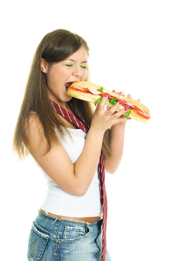Pretty girl eating a hamburger
