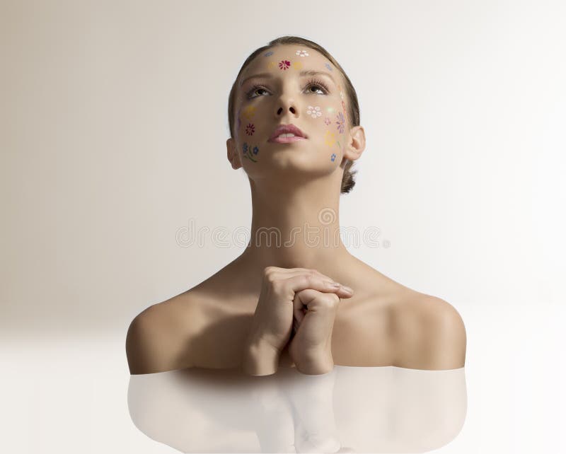Pretty Girl with Floral Makeup in Prayer Position Stock Photo Image
