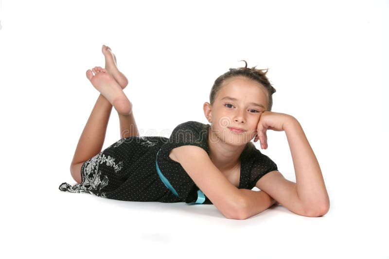 Pretty girl on her stomach stock image. Image of child 6253811