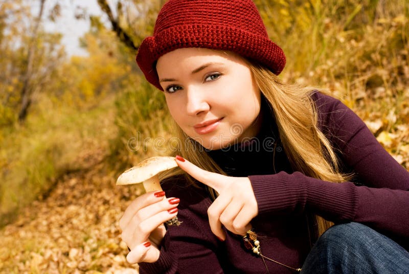 Pretty girl with a mushroom