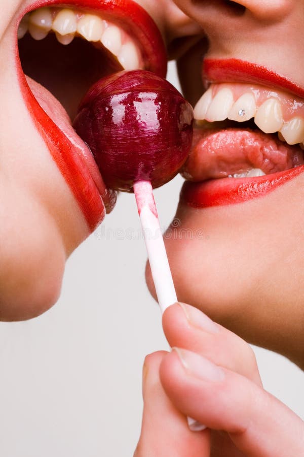 Pretty girl with pink lollipop