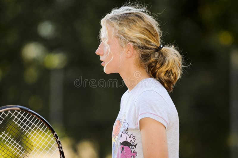 Pretty girl playing tennis