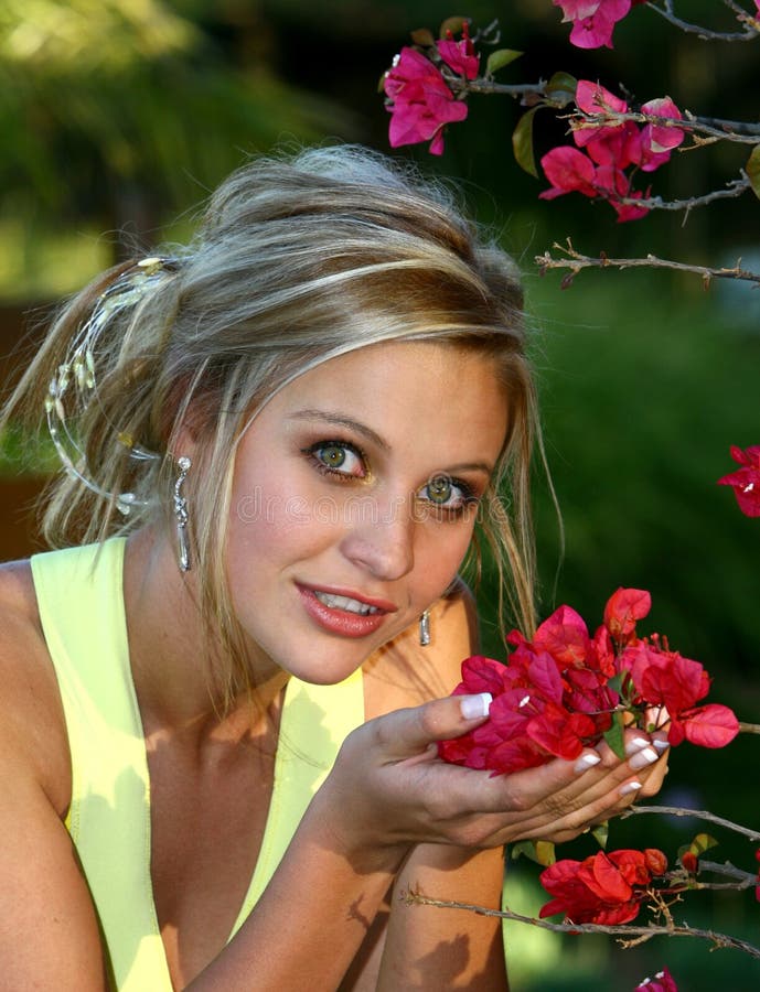 Pretty Girl with Red Flowers Stock Photo Image of flirting, holding