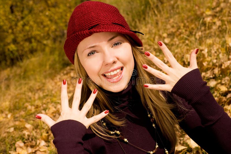 Pretty girl showing her beautiful nails