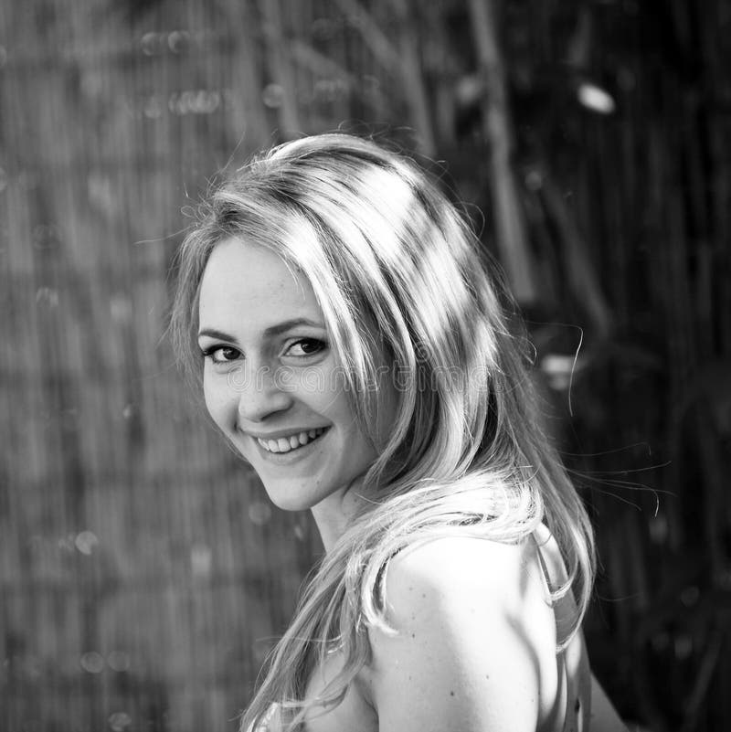 Pretty girl smiling in black an white