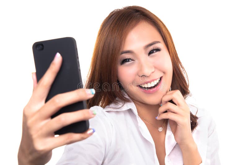 Pretty girl take a self portrait with her smart phone.