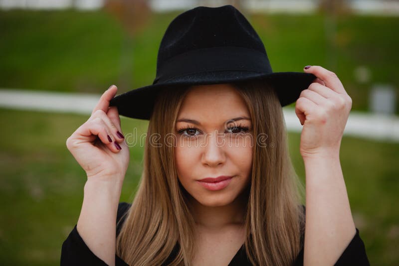 Pretty girl wearing hat stock image. Image of clothes 83795847