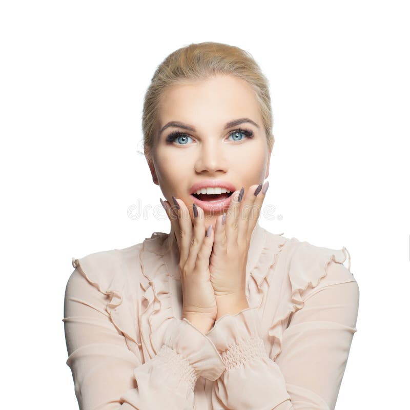 Pretty happy excited woman isolated on white background. Surprised girl with opened mouth, female face closeup stock photo Pretty happy excited woman isolated on white background. Surprised girl with opened mouth, female face closeup stock photo
