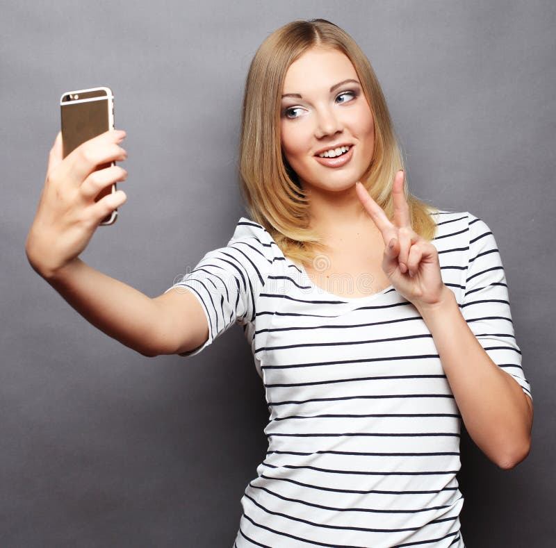 Pretty Hipster Girl Taking Selfie. Stock Image - Image of happy, mobile