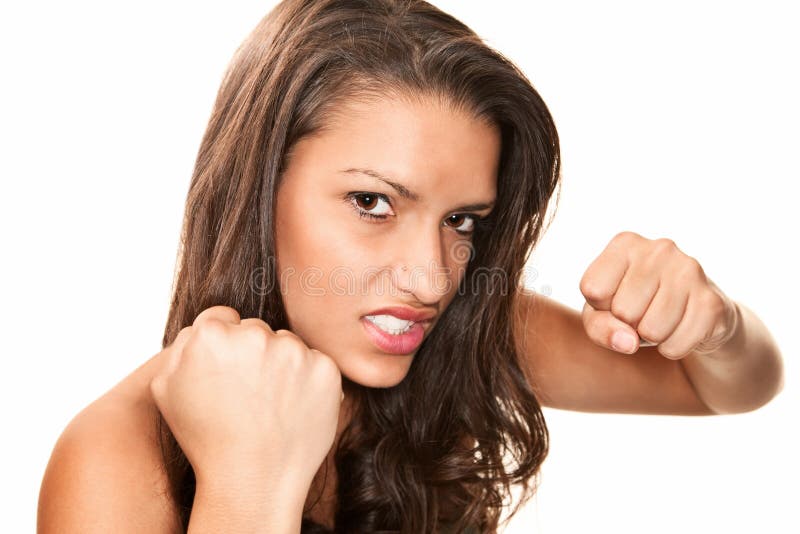 Pretty Hispanic Woman Throwing A Punch Stock Image Image 11832191