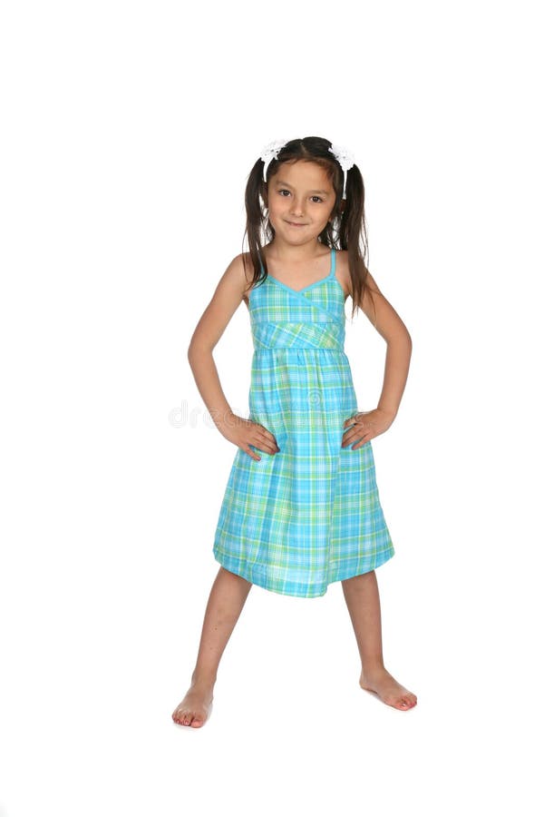 Pretty kindergarten aged child in blue dress