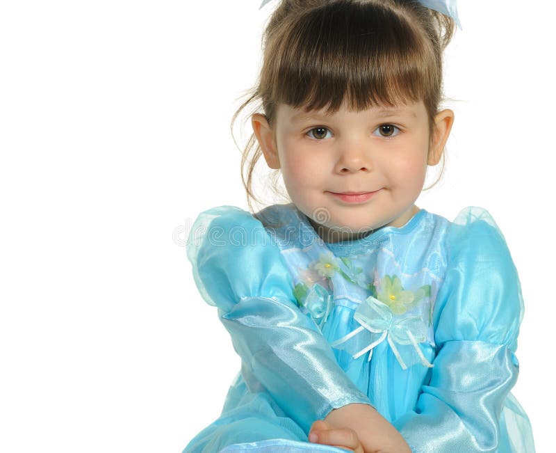 Pretty the little girl in a blue dress royalty free stock images Pretty the little girl in a blue dress royalty free stock images