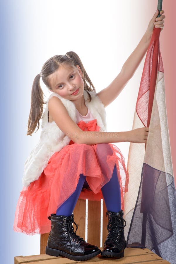 A Pretty Little Girl with a French Flag Stock Photo - Image of cute