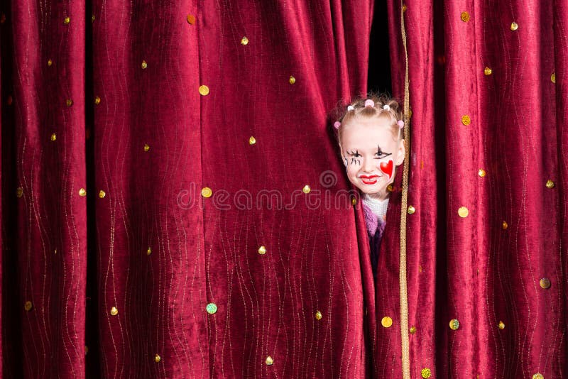 Pretty little girl waiting to come out on stage