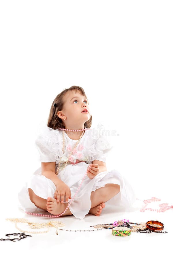 Pretty little girl in white dress