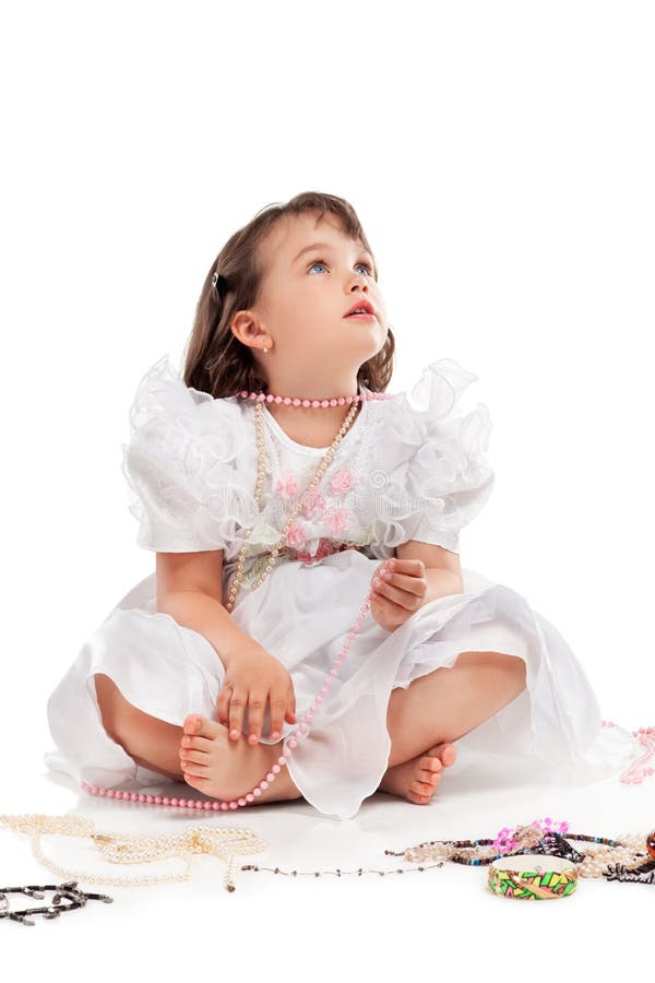 Pretty little girl in white dress