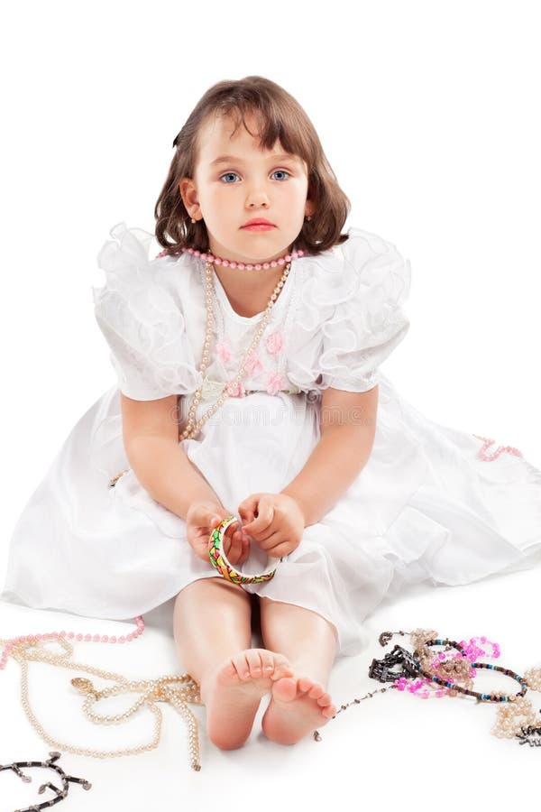 Pretty little girl in white dress