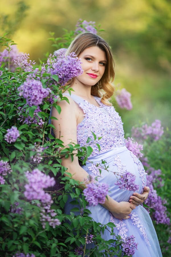 Pretty Pregnant Girl in Blossom Lilac Garden Stock Photo - Image of ...