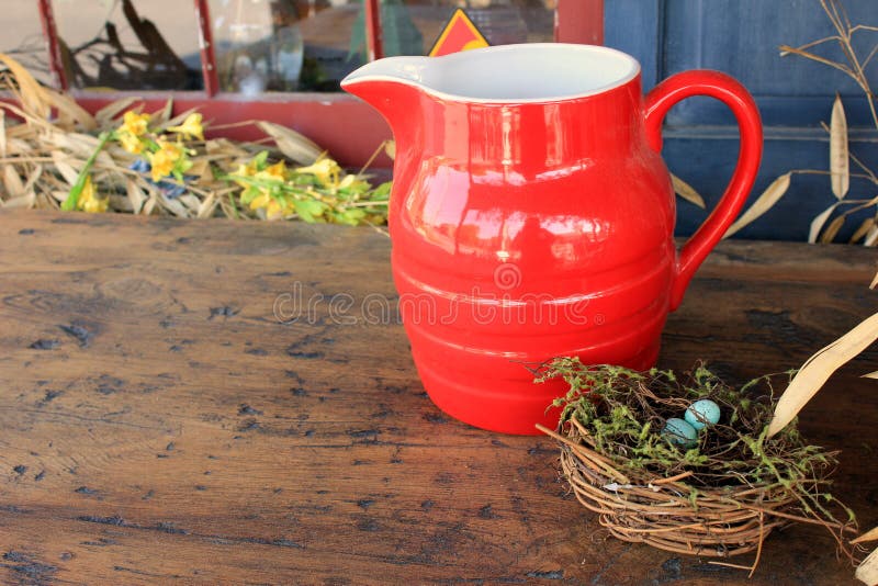 Pretty red pitcher stock photo