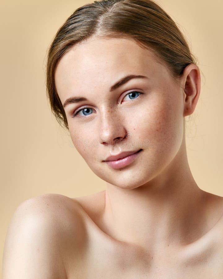 Pretty Redhead Teenage Girl With Blue Eyes And Freckles