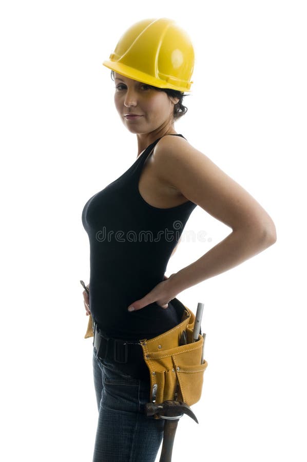 Pretty young woman construction worker contractor with tools and hard hat.