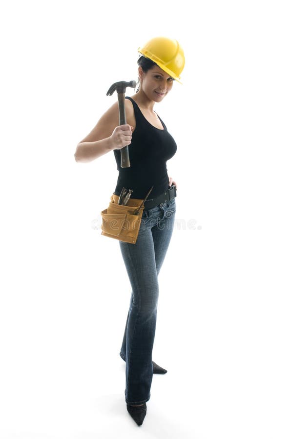Lindo mujer joven construcción obrero proveedor herramientas a duro un sombrero.