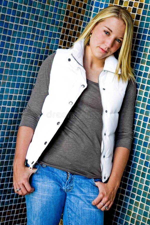 Pretty teen girl with blonde hair stock photography