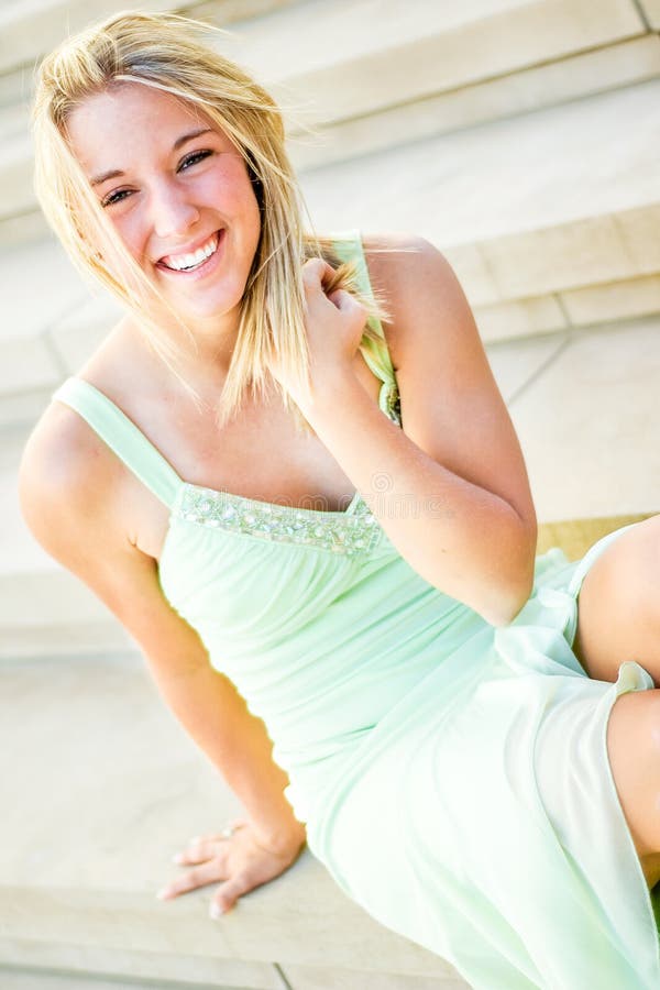 Pretty teen girl with blonde hair stock image