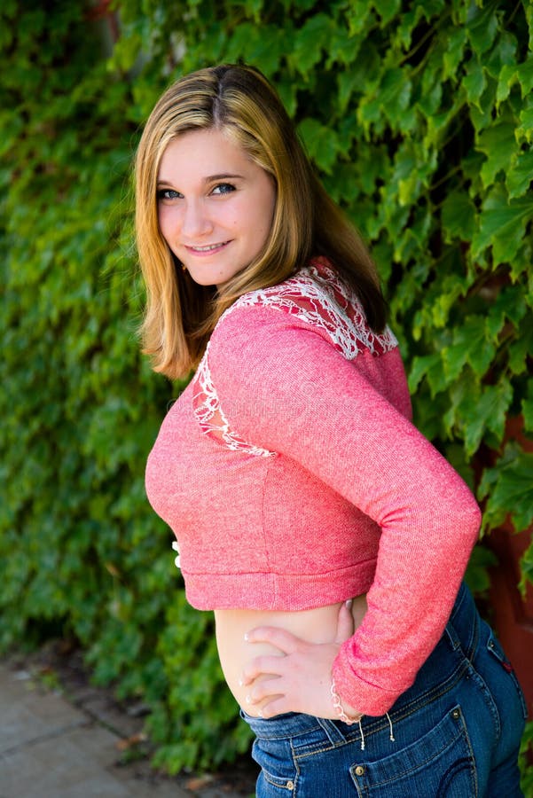 Pretty Teen Girl Pink Sweater Green Ivy Stock Image I