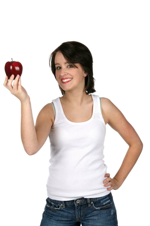 Pretty teen offering a red apple