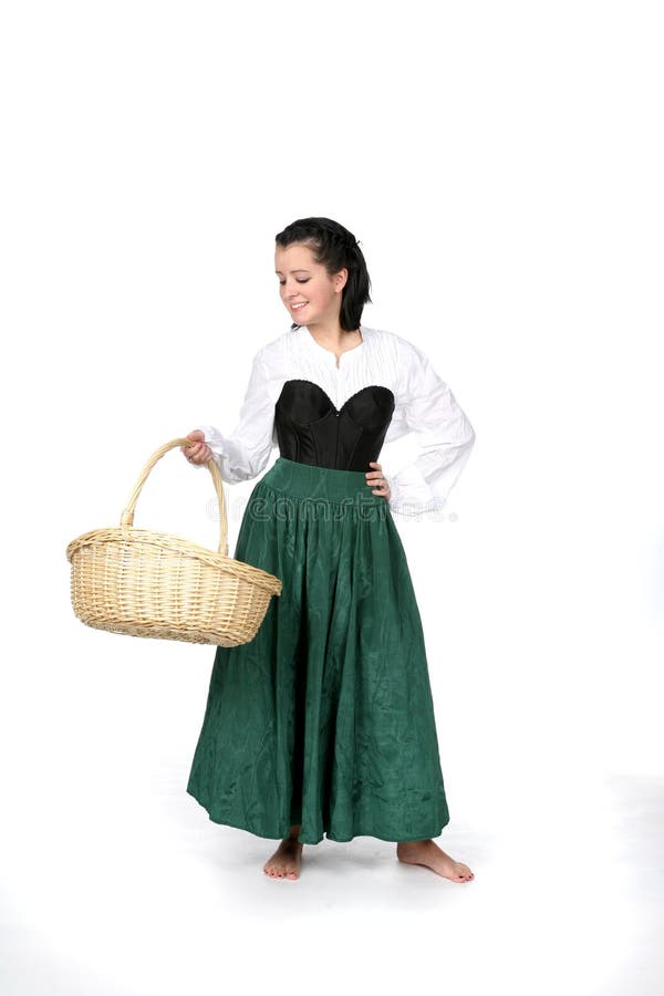 Pretty teenage girl looking at wicker basket